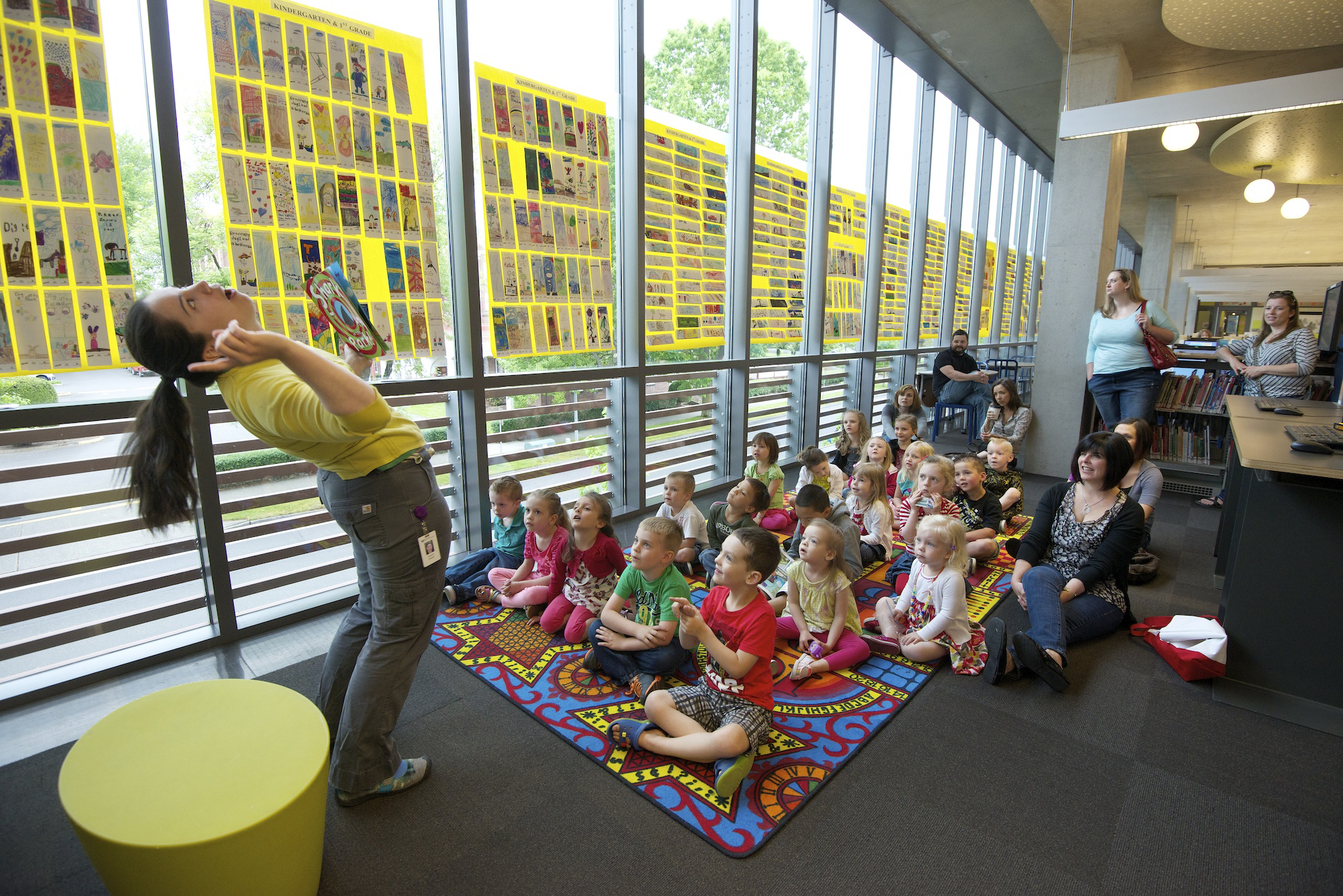 Librarian Spending Time Reading to Kids Aloud